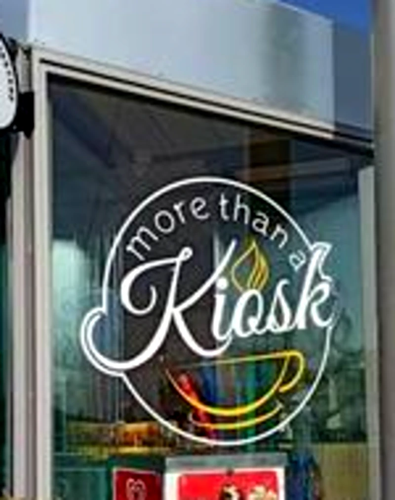 Το λογότυπο More Than a Kiosk στην πρόσοψη